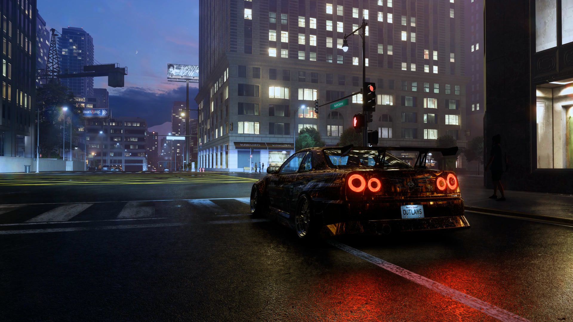 NFS Unbound with the OUTLAWS mod: a Nissan Skyline R34 waiting at a red light on a wet Lakeshore street at night